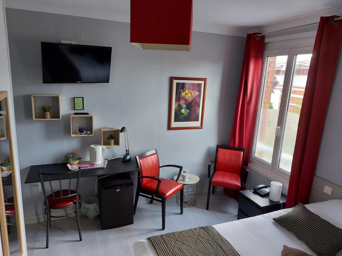 Hotel De La Paix Албер Екстериор снимка